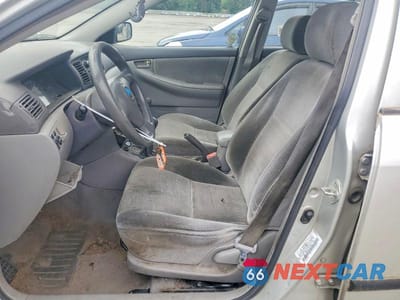 Zdjęcie 7 z 12 samochodu: 2003 TOYOTA COROLLA CE VIN:1NXBR32E73Z030565 - miniatura