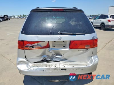 Zdjęcie 6 z 13 samochodu: 2001 HONDA ODYSSEY LX VIN:2HKRL18571H531091 - miniatura