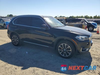 Czwarte zdjęcie samochodu z boku: 2015 BMW X5 XDRIVE50I VIN:5UXKR6C50F0J79415 - miniatura