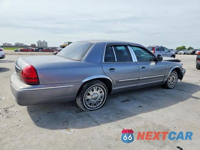 Trzecie zdjęcie samochodu z tyłu: 2006 MERCURY GRAND MARQUIS GS VIN:2MEFM74V96X610811 - miniatura