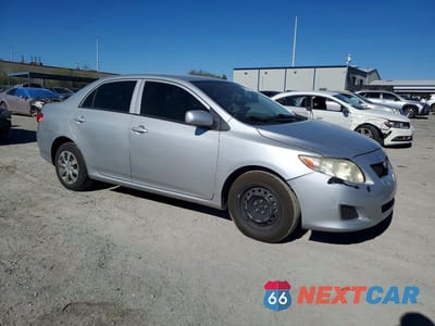 Czwarte zdjęcie samochodu z boku: 2010 TOYOTA COROLLA LE VIN:JTDBU4EE9AJ067023 - miniatura