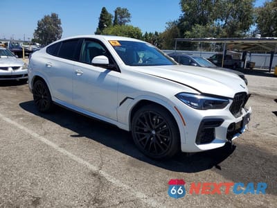 Czwarte zdjęcie samochodu z boku: 2023 BMW X6 XDRIVE40I VIN:5UXCY6C01P9P02899 - miniatura