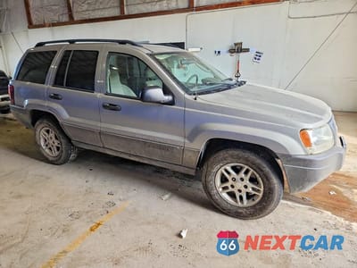 Czwarte zdjęcie samochodu z boku: 2004 JEEP GRAND CHEROKEE LAREDO VIN:1J4GW48S34C238675 - miniatura