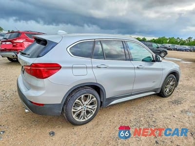 Trzecie zdjęcie samochodu z tyłu: 2017 BMW X1 XDRIVE28I VIN:WBXHT3Z34H4A57871 - miniatura