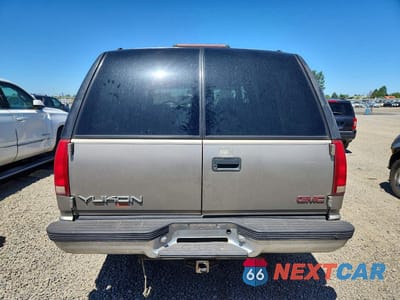 Zdjęcie 6 z 13 samochodu: 1999 GMC YUKON VIN:1GKEK13R0XJ734825 - miniatura