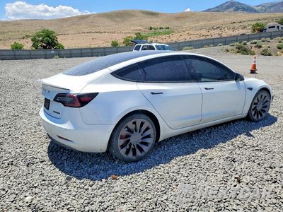 Trzecie zdjęcie samochodu z tyłu: 2021 TESLA MODEL 3 VIN:5YJ3E1EC1MF070881 - miniatura