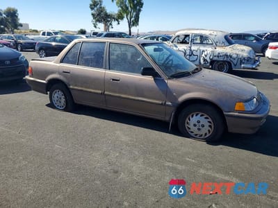 Czwarte zdjęcie samochodu z boku: 1990 HONDA CIVIC LX VIN:1HGED3657LL026629 - miniatura