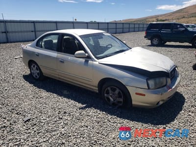Czwarte zdjęcie samochodu z boku: 2001 HYUNDAI ELANTRA GLS VIN:KMHDN45D81U091224 - miniatura