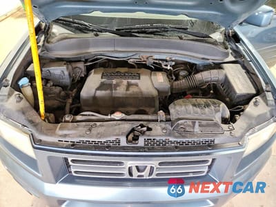 Zdjęcie 11 z 12 samochodu: 2006 HONDA RIDGELINE RTL VIN:2HJYK16536H505228 - miniatura