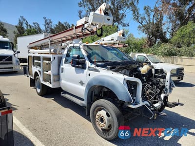 Czwarte zdjęcie samochodu z boku: 2015 FORD F450 SUPER DUTY VIN:1FDUF4GT3FEB98491 - miniatura