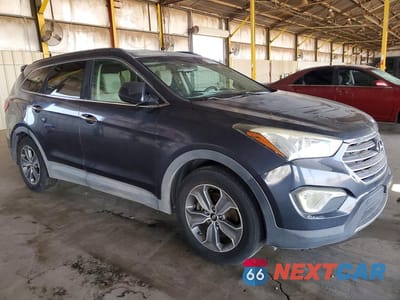 Czwarte zdjęcie samochodu z boku: 2016 HYUNDAI SANTA FE SE VIN:KM8SM4HF3GU155220 - miniatura