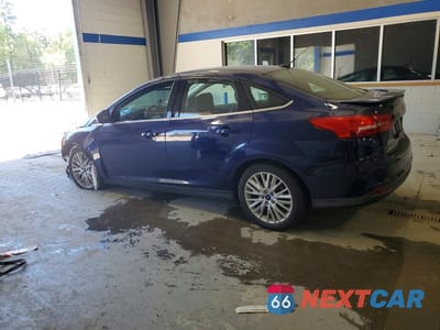 Drugie zdjęcie samochodu z przodu: 2016 FORD FOCUS TITANIUM VIN:1FADP3J26GL335759 - miniatura