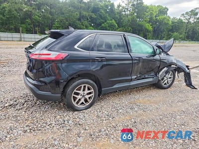 Trzecie zdjęcie samochodu z tyłu: 2023 FORD EDGE SEL VIN:2FMPK4J91PBA19108 - miniatura