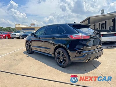 Trzecie zdjęcie samochodu z tyłu: 2019 FORD EDGE ST VIN:2FMPK4AP2KBB95737 - miniatura