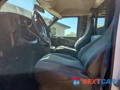 Zdjęcie 7 z 13 samochodu: 2014 GMC SAVANA G1500 VIN:1GTS8AF47E1182332 - miniatura