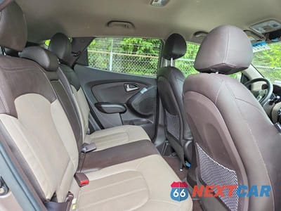 Zdjęcie 11 z 13 samochodu: 2013 HYUNDAI TUCSON LIMITED VIN:KM8JUCAC3DU621147 - miniatura