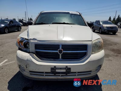 Piąte zdjęcie samochodu w środku: 2010 DODGE CALIBER SXT VIN:1B3CB4HA5AD613237 - miniatura