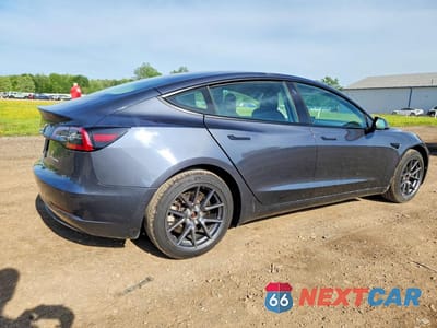 Trzecie zdjęcie samochodu z tyłu: 2022 TESLA MODEL 3 VIN:5YJ3E1EB6NF236725 - miniatura