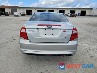 Zdjęcie 6 z 13 samochodu: 2010 FORD FUSION SE VIN:3FAHP0HA6AR128827 - miniatura