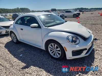 Czwarte zdjęcie samochodu z boku: 2017 VOLKSWAGEN BEETLE 1.8T VIN:3VWF17AT4HM625726 - miniatura