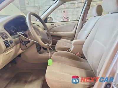 Zdjęcie 7 z 12 samochodu: 2001 TOYOTA COROLLA LE VIN:1NXBR12E61Z558048 - miniatura