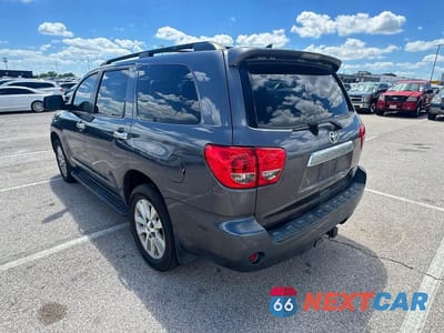 Trzecie zdjęcie samochodu z tyłu: 2012 TOYOTA SEQUOIA PLATINUM VIN:5TDDW5G11CS071124 - miniatura