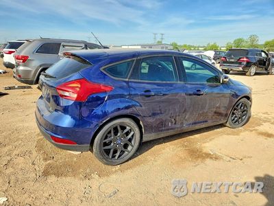 Trzecie zdjęcie samochodu z tyłu: 2016 FORD FOCUS SE VIN:1FADP3K20GL336694 - miniatura