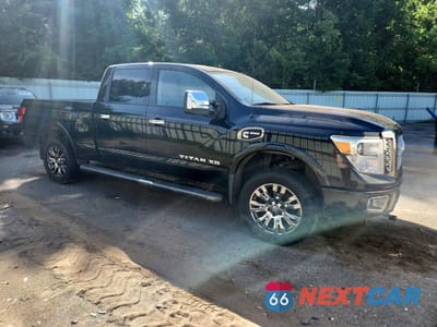 Czwarte zdjęcie samochodu z boku: 2017 NISSAN TITAN XD PLATINUM RESERVE VIN:1N6BA1F45HN560615 - miniatura