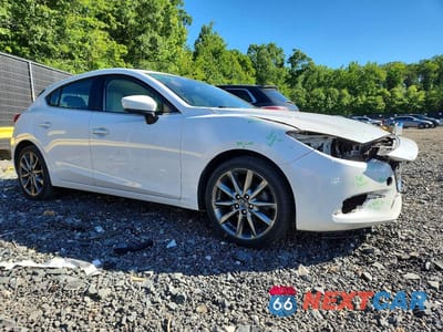 Czwarte zdjęcie samochodu z boku: 2018 MAZDA 3 GRAND TOURING VIN:3MZBN1M35JM265593 - miniatura