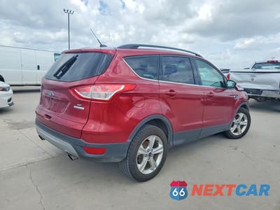 Trzecie zdjęcie samochodu z tyłu: 2014 FORD ESCAPE SE VIN:1FMCU0G93EUE51831 - miniatura