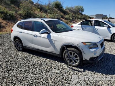 Czwarte zdjęcie samochodu z boku: 2014 BMW X1 XDRIVE28I VIN:WBAVL1C56EVY14512 - miniatura