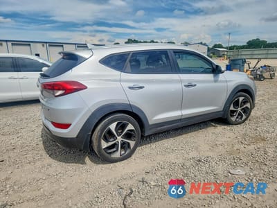 Trzecie zdjęcie samochodu z tyłu: 2016 HYUNDAI TUCSON LIMITED VIN:KM8J33A25GU040232 - miniatura