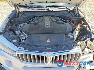 Zdjęcie 11 z 12 samochodu: 2014 BMW X5 XDRIVE50I VIN:5UXKR6C54E0C02454 - miniatura