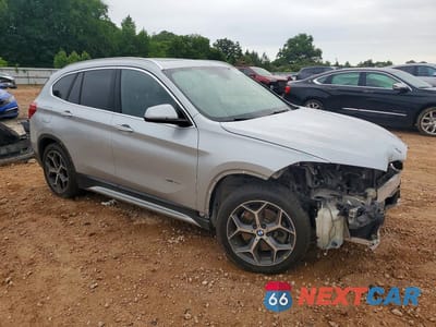 Czwarte zdjęcie samochodu z boku: 2018 BMW X1 XDRIVE28I VIN:WBXHT3C36J5F90135 - miniatura