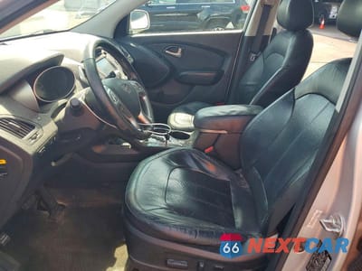 Zdjęcie 7 z 12 samochodu: 2012 HYUNDAI TUCSON LIMITED VIN:KM8JU3AC2CU487035 - miniatura