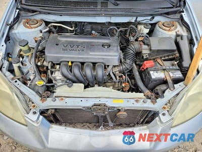 Zdjęcie 12 z 13 samochodu: 2006 TOYOTA COROLLA MATRIX XR VIN:2T1KR32E96C603228 - miniatura