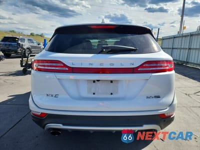 Zdjęcie 6 z 13 samochodu: 2015 LINCOLN MKC VIN:5LMCJ2A92FUJ30780 - miniatura