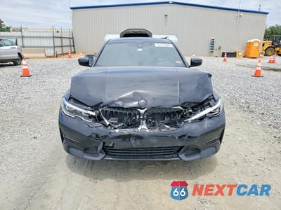 Piąte zdjęcie samochodu w środku: 2021 BMW 330I VIN:3MW5R1J09M8C09620 - miniatura