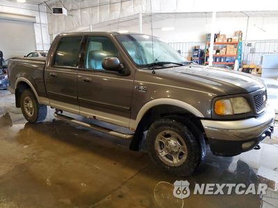 Czwarte zdjęcie samochodu z boku: 2003 FORD F150 LARIAT SUPERCRE VIN:1FTRW08LX3KD59336 - miniatura
