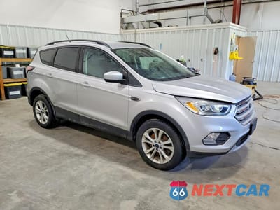 Czwarte zdjęcie samochodu z boku: 2018 FORD ESCAPE SEL VIN:1FMCU9HD3JUA19449 - miniatura
