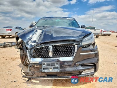 Piąte zdjęcie samochodu w środku: 2021 LINCOLN AVIATOR RESERVE VIN:5LM5J7WC0MGL18753 - miniatura