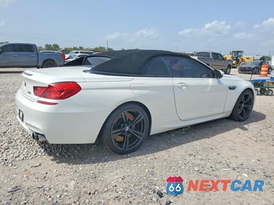 Trzecie zdjęcie samochodu z tyłu: 2016 BMW M6 VIN:WBS6G9C57GD931995 - miniatura