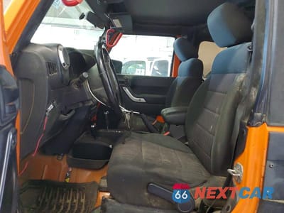 Zdjęcie 7 z 13 samochodu: 2012 JEEP WRANGLER SAHARA VIN:1C4AJWBG1CL228607 - miniatura
