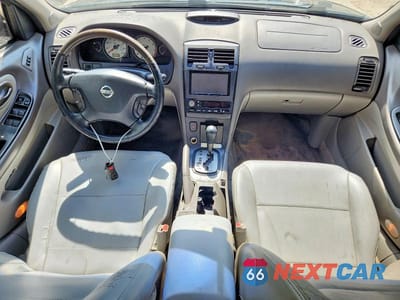 Zdjęcie 8 z 12 samochodu: 2002 NISSAN MAXIMA GXE VIN:JN1DA31D02T452844 - miniatura