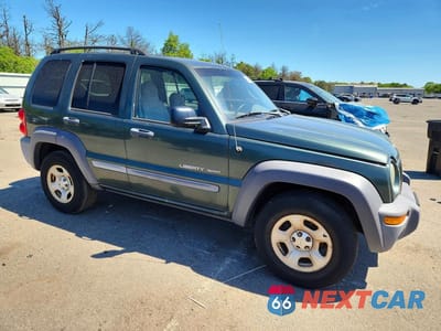 Czwarte zdjęcie samochodu z boku: 2003 JEEP LIBERTY SPORT VIN:1J4GL48K23W554865 - miniatura