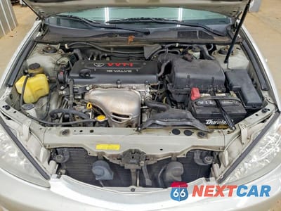 Zdjęcie 11 z 12 samochodu: 2003 TOYOTA CAMRY LE VIN:JTDBE32K330227956 - miniatura