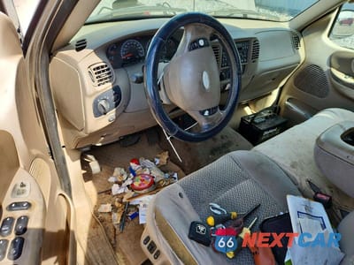 Zdjęcie 8 z 13 samochodu: 2002 FORD F150 SUPERCREW VIN:1FTRW07682KE38675 - miniatura