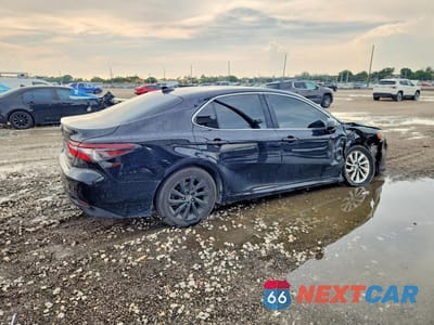 Trzecie zdjęcie samochodu z tyłu: 2023 TOYOTA CAMRY LE VIN:4T1C11AK5PU788482 - miniatura