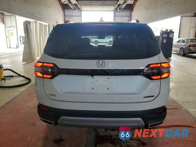 Zdjęcie 6 z 13 samochodu: 2024 HONDA PILOT TOURING VIN:5FNYG1H77RB000047 - miniatura