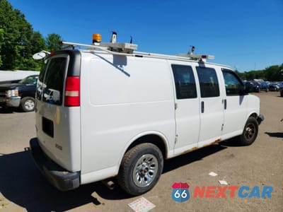 Trzecie zdjęcie samochodu z tyłu: 2014 GMC SAVANA G1500 VIN:1GTS8AF47E1182332 - miniatura